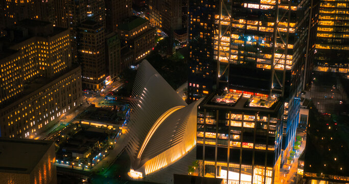 Aerial Photo with Lower Manhattan Financial District with Office Architecture at Night. Picture Focusing on Oculus Station at World Trade Center Transportation Hub