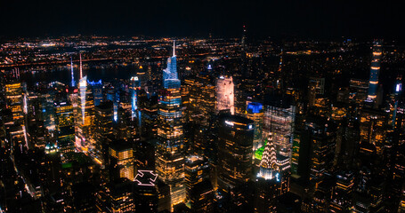 Helicopter Tour of New York City Architecture at Night. Fly-By Over Midtown Manhattan Office...