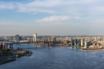 Naklejka premium New York Cityscape with Residential Neighbourhoods. Aerial Image of Housing Complexes from a Helicopter. Panoramic View of a Big Modern City