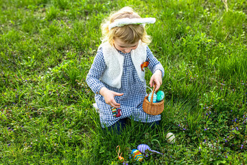 Easter egg hunt featuring a girl, exploring the meadow and uncovering hidden treasures in the form...