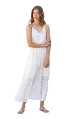 Beautiful young woman in a white summer dress standing barefoot isolated on white background