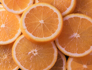 oranges cut into slices and laid out on the table as a food background 3