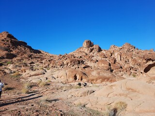 A beautiful  daytime view of the mountain range adjacent to Split Rock in Tabuk, Saudi Arabia.