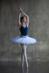 Young ballerina in a white tutu
