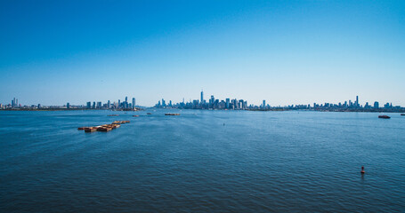 Aerial Photo of Manhattan Island with Office and Apartment Buildings. Hudson River Scenery with...
