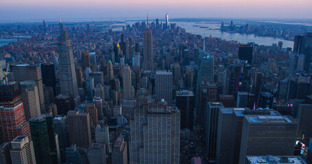 Scenic Aerial New York City Evening View Towards Manhattan Architecture. Panoramic Shot of Midtown Financial District from a Helicopter. Cityscape with Office Buildings and Skyscrapers