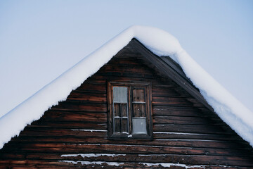 Fototapeta na wymiar Winter time in the cultural landscape of Toten, Norway, in January. Image shot in the area between Kolbu Church and Gardlausstua.