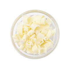 Bowl of tasty chocolate shavings isolated on white, top view