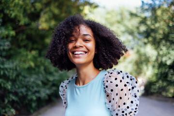 Happy african american teen girl in casual cloth