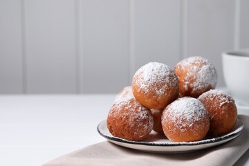 Delicious sweet buns on white table, space for text