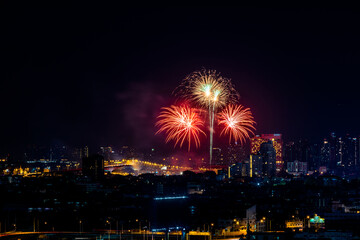 The blurred background of fireworks (light trails) is beautiful at night, seen in the New Year holidays, Christmas events, for tourists to take pictures during public travel.