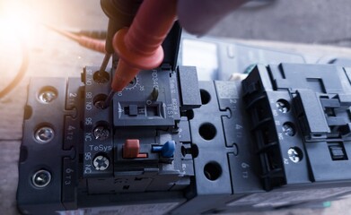 Checking magnetic contactor terminals using a multimeter, magnetic contactor electrical control...