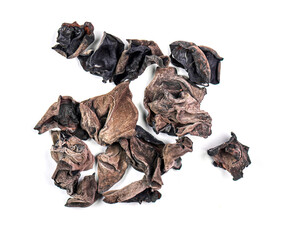 Dried asian mushrooms auricularia polytricha, cloud ear isolated on white, top view