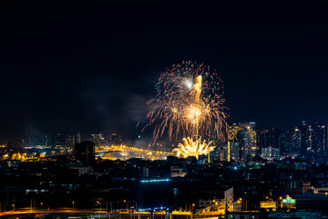 The blurred background of fireworks (light trails) is beautiful at night, seen in the New Year holidays, Christmas events, for tourists to take pictures during public travel.