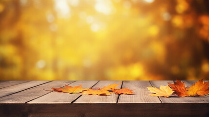 Naklejka na ściany i meble wooden table with orange leaves autumn background