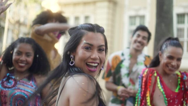 Exuberant Brazilian Carnival, Woman Reveling in Dance as Confetti Falls, Joyous Street Celebration with Friends
