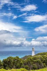 Fototapeta na wymiar Seascape with Cape Otway lighthouse and national park. Great Ocean Road, Australia. This is the oldest working lighthouse in the state of Victoria.