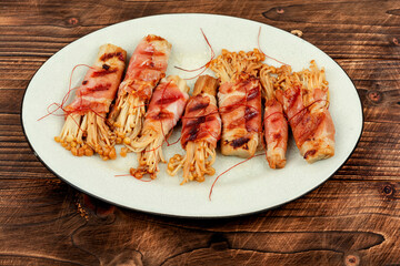Enoki mushroom appetizer fried in bacon