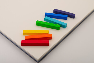 Colored crayons of soft pastels.