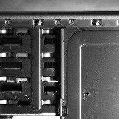 Metal computer case close-up. Computer Accessories Conception. Digital Wallpaper. Monochrome