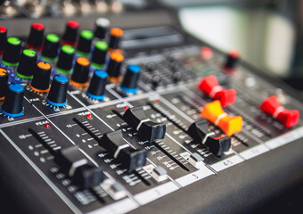 Sound recording equipment knobs. Mixer control. Music engineer. Backstage controls on an audio mixer, Sound mixer. Professional audio mixing console, buttons, faders and sliders. sound check.