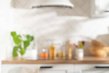 Fototapeta na wymiar Blurred kitchen background, mockup, display for product advetising