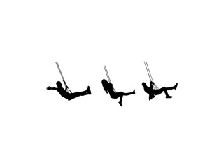 young boy and girl swings sideways silhouette.
