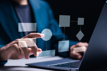 Businessman use laptop with virtual flowchart for business process and workflow with flowchart and processing management concept.