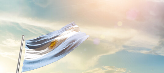 Argentina national flag cloth fabric waving on the sky - Image
