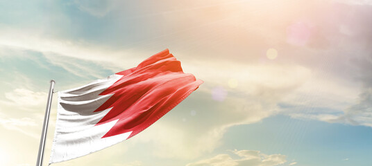 Bahrain national flag cloth fabric waving on the sky - Image