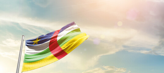 Central African Republic national flag cloth fabric waving on the sky - Image