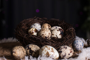 Rustic Easter, quail eggs in a ceramic bowl on the table. The Bright Easter Holiday