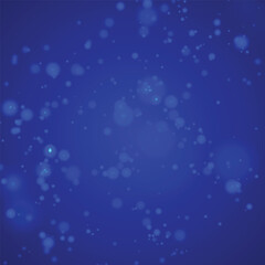 Glittery round bokeh background with blue gradation