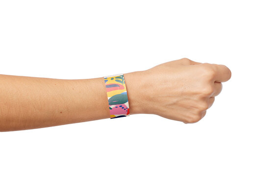 Mockup of person wearing customizable paper wrist-band