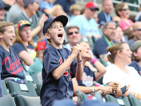 Excitement in the Stands: Child's Victory with a Foul Catch