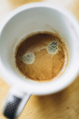 a large coffee mug in which you can see the coffee