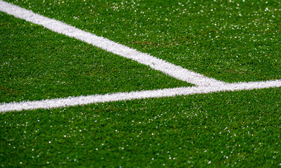 Line marking on an artificial football field
