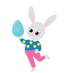 A happy Easter bunny wearing pants and a shirt holds a painted egg in his paws. Festive illustration in cartoon style isolated on white background.