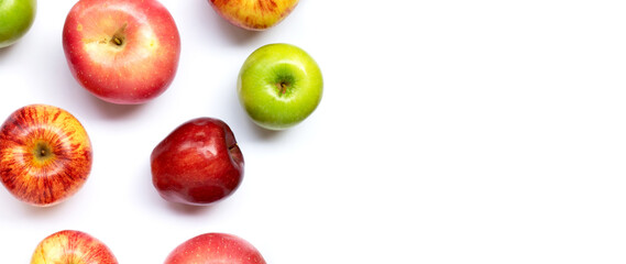 Variety of fresh apples on white background.
