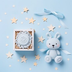 Baby accessories concept top view photo of gift box teether knitted bunny rattle toy and stars on isolated pastel blue background with empty space - Gen AI