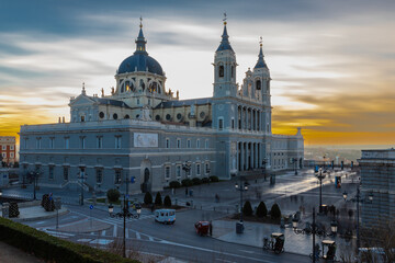 Madrid, Spain 28-12-2022 The Almudena Cathedral during a colorful sunset, it is the most important ...