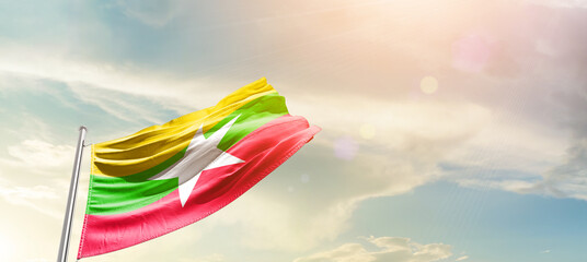 Myanmar  national flag cloth fabric waving on the sky - Image