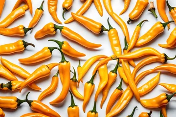 Keuken spatwand met foto Yellow fresh chili peppers on white background. © Zoraiz