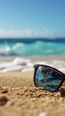 Fototapeta na wymiar Sunglasses on Sandy Beach, A Perfect Summer Accessory for Sun Protection