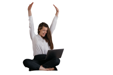 Expressive young brunette businesswoman in glasses, white shirt and black pants making video call rising hands up, celebrating great deal against transparent background, laughing