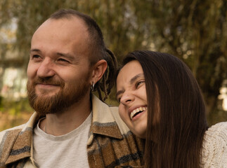 middle aged heterosexual couple in love happy and hugging in nature