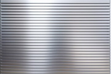 Obraz premium Close-up silver metallic object, abstract background