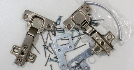 Capturing the essence of interior design, this photo showcases an array of furniture accessories, including fittings and handles. The accessories blend seamlessly.