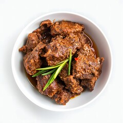 Rendang, a rich and aromatic Indonesian beef dish, isolated on a clean white background