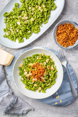 Spinach spaetzle with parmesan and roasted onions - German egg noodles